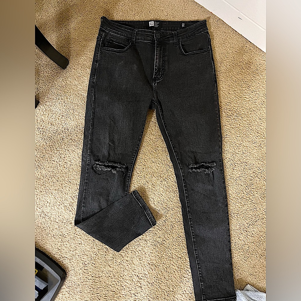 Lira black acid wash distressed size 32 waist pants.
